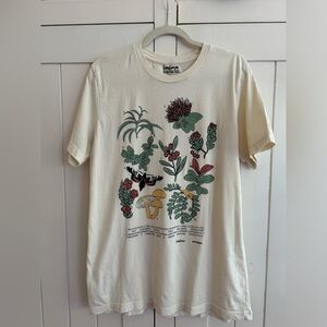 Hawaiian graphic tee, Flora + Fauna + Fungi by Laulima in cream, 100% cotton.
